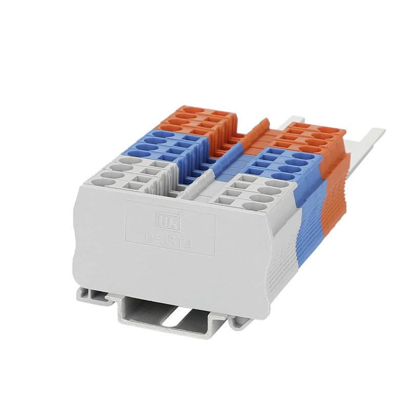 Elektrischer Steckverbinder mit blauen, roten und grauen Kontaktplatten und Erdungsanschluss zur Leiterverbindung in Schalttafeln.