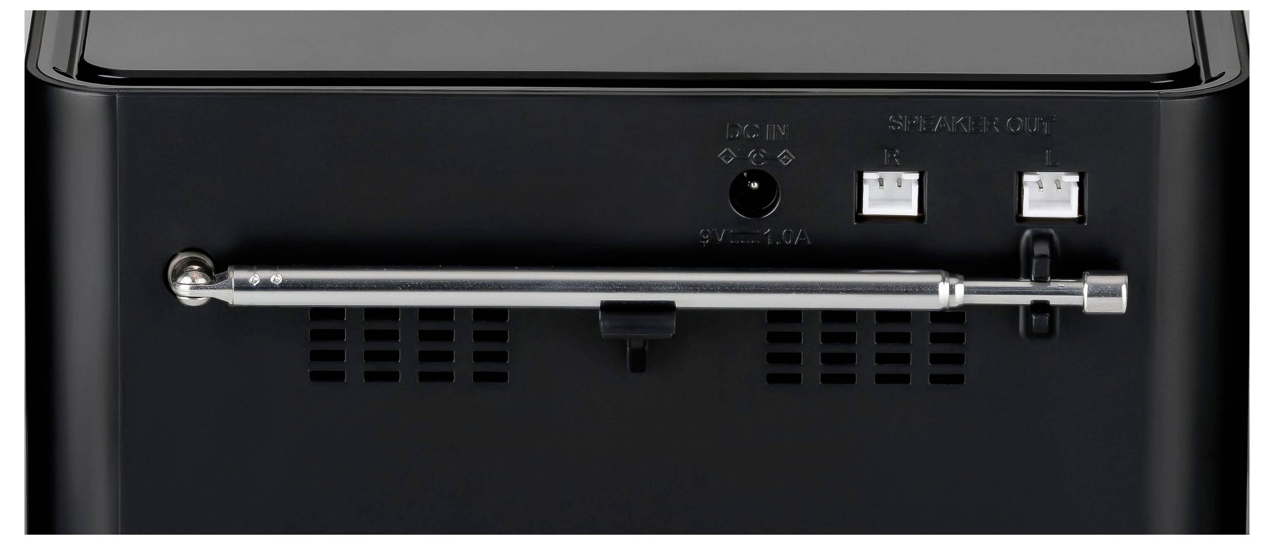 Nahaufnahme eines schwarzen Geräte-Bedienfelds mit einem Chromgriff, Stromschaltern und zwei USB-Anschlüssen.