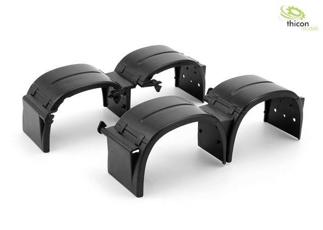 Schwarze, gebogene Kunststoffteile auf weißem Hintergrund, vermutlich Teile eines Modells oder Bausatzes der Marke Thicon Models.