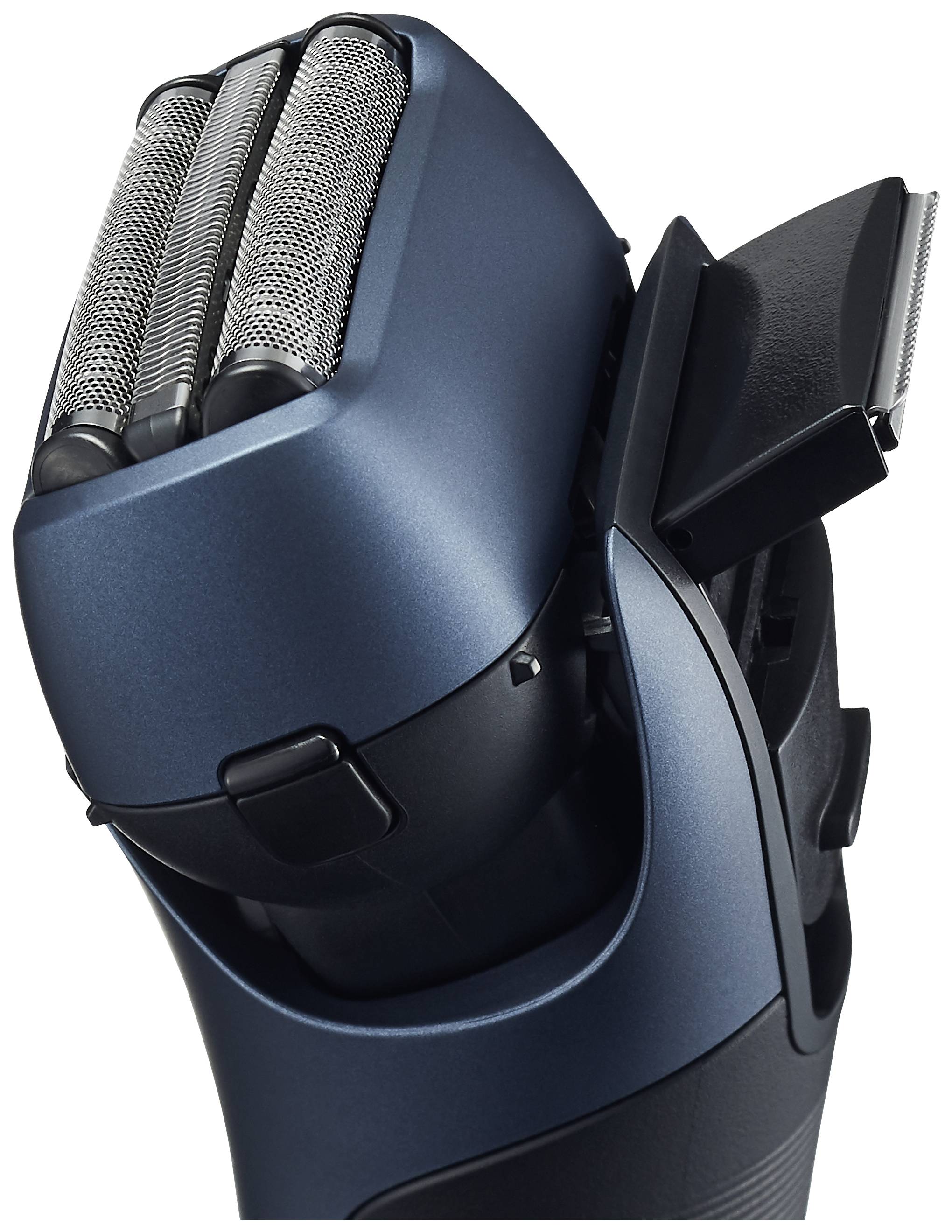 Elektrischer Rasierer mit zwei Scherköpfen und Trimmer. Gerät in dunkelblauem Gehäuse, geeignet für präzise Rasur und Konturen.