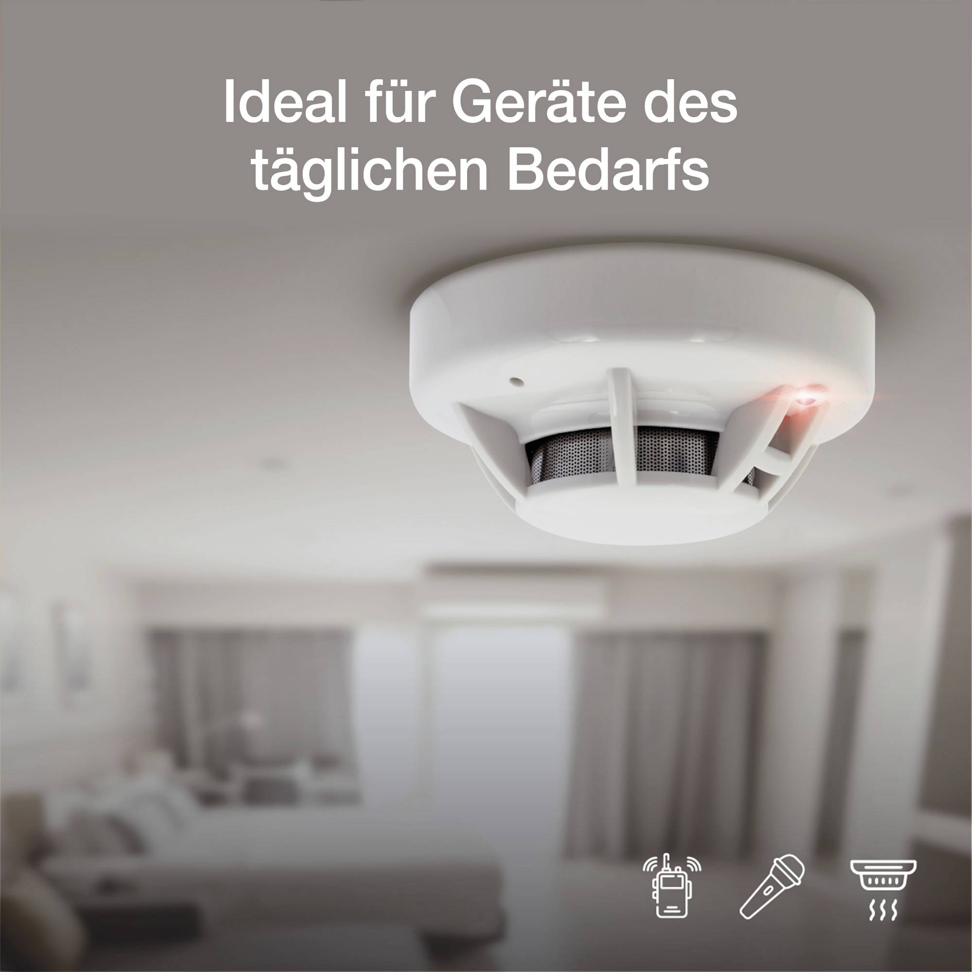 Ein Rauchmelder hängt an der Decke in einem Wohnraum. Der Text 'Ideal für Geräte des täglichen Bedarfs' ist zu lesen. Symbole für Smartphone, Rauchmelder und Temperatur sind darunter abgebildet.