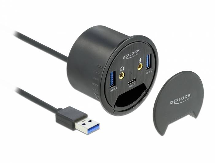 Ein schwarzer runder USB-Hub für Schreibtische mit USB 3.0, Audio-Anschlüssen und USB-C. Zeigt Marke Delock auf Deckel.