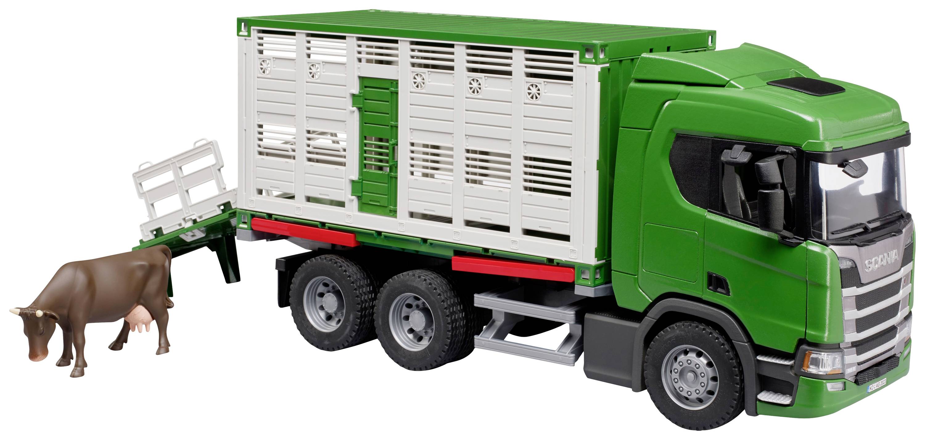 Ein grüner Spielzeug-LKW mit Viehtransportanhänger, aus dem eine braune Kuh herausgeführt wird.
