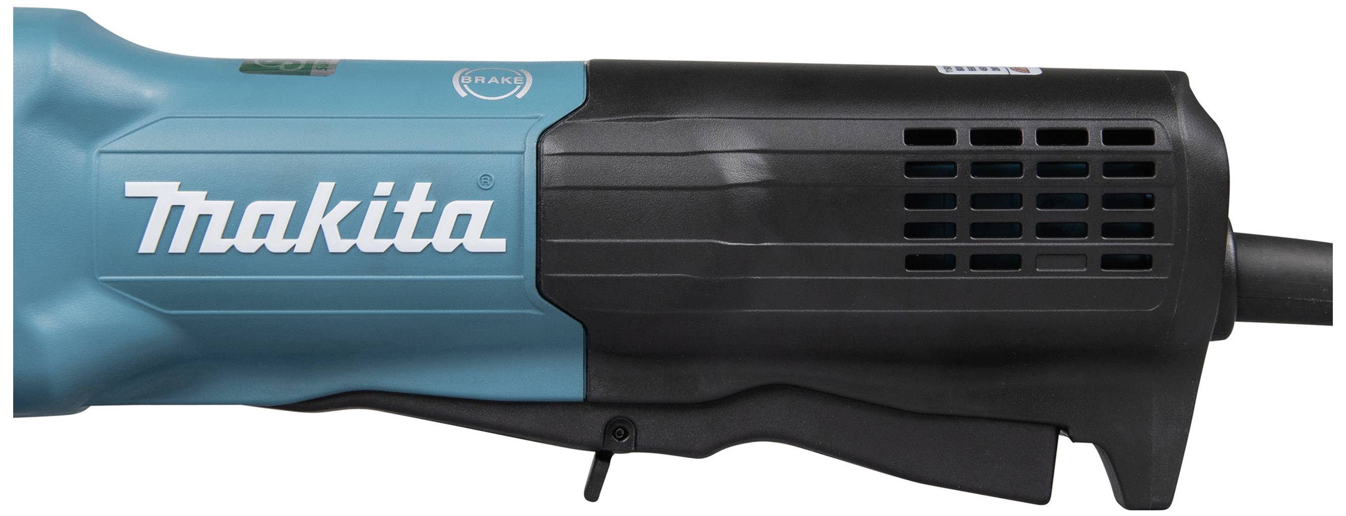 Eine elektrische blaue und schwarze Makita-Säge seitlich dargestellt, der Griff und Antriebsmechanismus sind sichtbar, Markenzeichen 'Makita'.