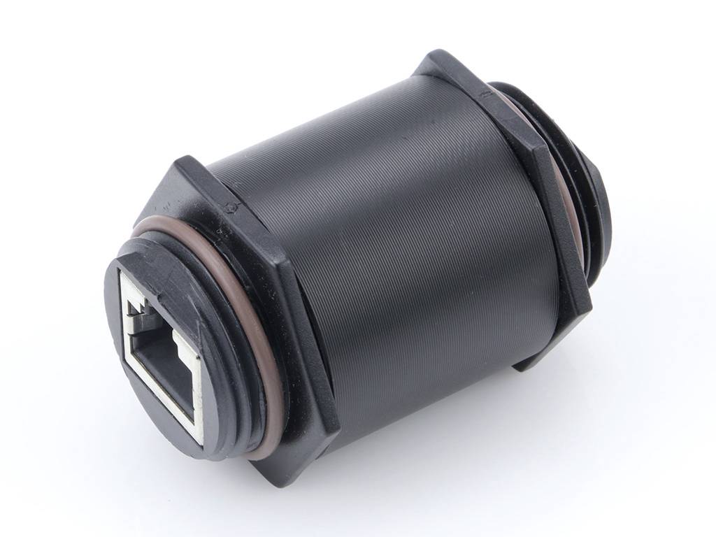 Schwarzer zylindrischer Adapter mit RJ-45 Netzwerkanschluss an einem Ende, Verwendung in elektronischen Anwendungen für Verbindungen.