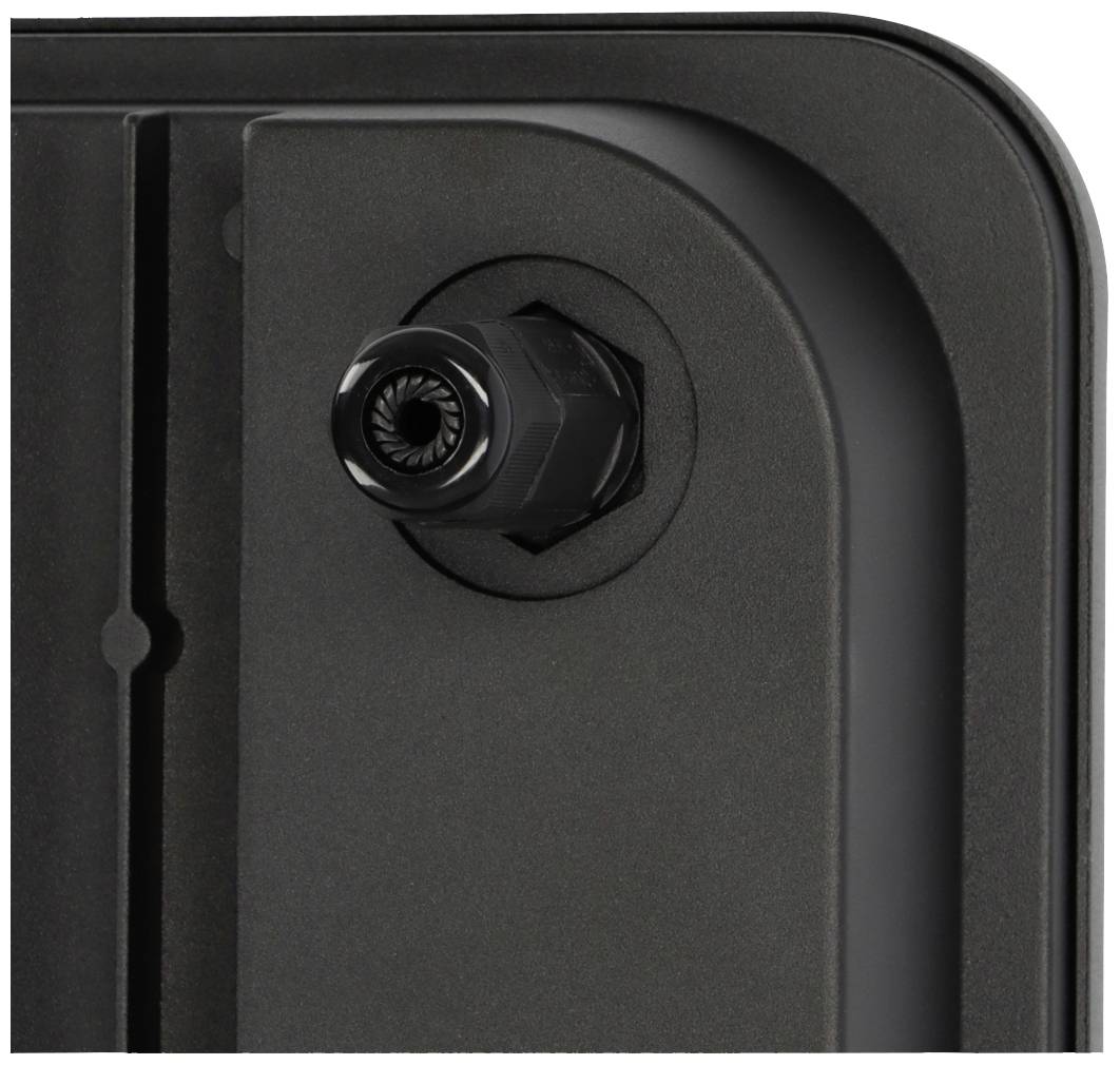 Eine schwarze Kamera, die in ein Gehäuse integriert ist, mit sichtbarem Objektiv in Nahaufnahme.