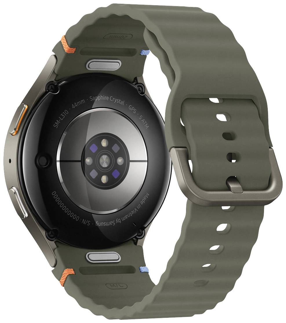 Rückansicht einer Smartwatch mit grünem Armband und schwarzem Gehäuse, Sensoren und Metallschließe sichtbar.