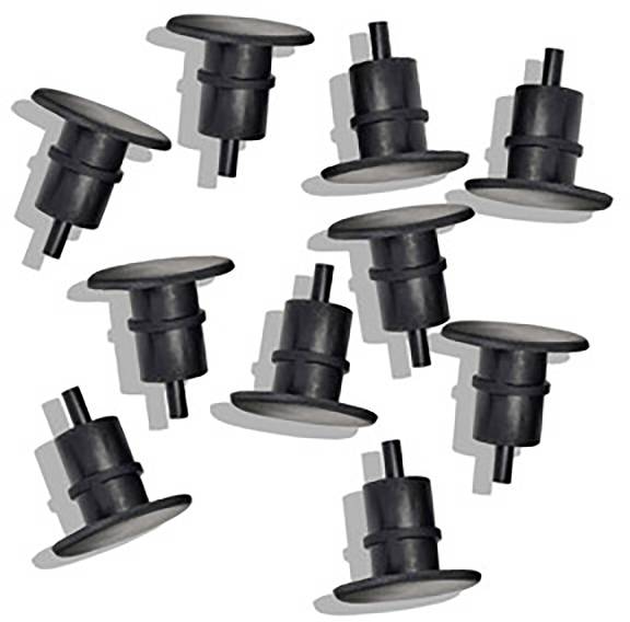 Mehrere schwarze Möbelgleiter aus Kunststoff in zufälliger Anordnung. Geeignet für den Schutz von Bodenbelägen vor Kratzern.