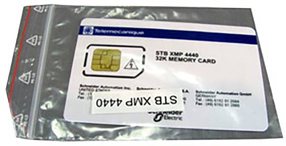 Eine Verpackung mit einer Speicherkarte beschriftet als 'STB XMP 4440 32K Memory Card', mit Firmen- und Produktinformationen.