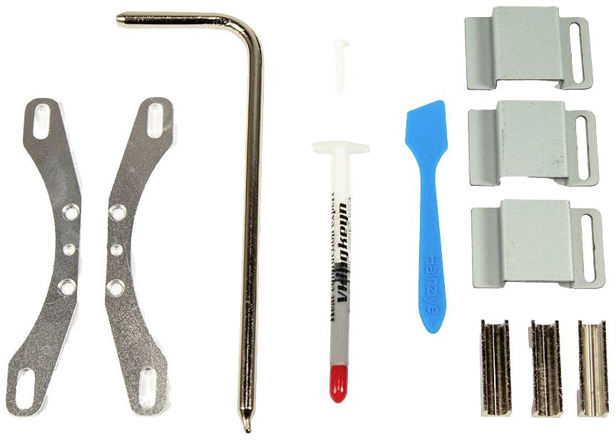 Ein Computerbausatz zeigt Metallhalterungen, einen Inbusschlüssel, Wärmeleitpaste, einen Kunststoffspatel und Montageteile.