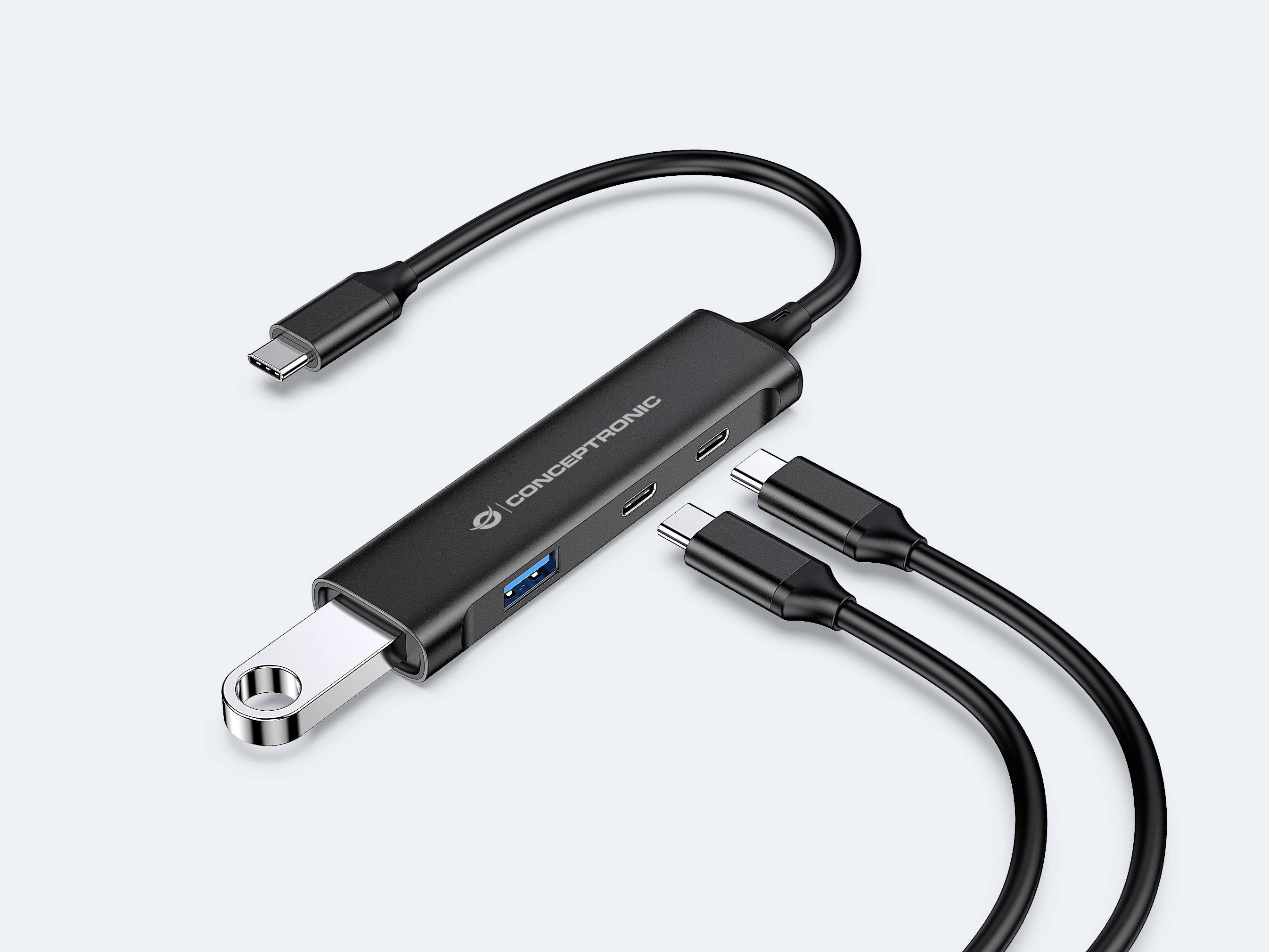 Ein schwarzes USB-C-Hub mit verschiedenen Anschlüssen und zwei Kabeln. Geeignet für den Anschluss mehrerer Geräte an einen Laptop.