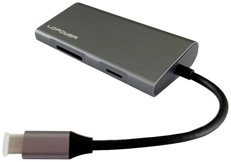 Ein grauer USB-C-Hub mit mehreren Anschlüssen für Datenübertragung und Ladefunktion, verbunden über ein kurzes Kabel an einem Stecker.