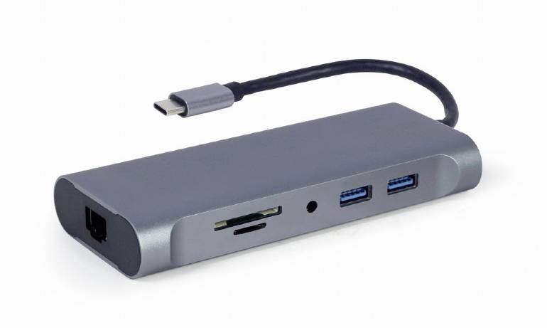 Ein grauer USB-C-Hub mit zwei USB-Anschlüssen, einem Ethernet-Port, einem MicroSD-Kartensteckplatz und einer Audio-Buchse.