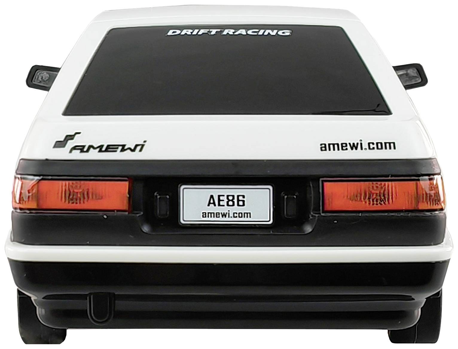 Ein weiß-schwarzes Modellauto mit der Beschriftung 'Drift Racing' auf der Heckscheibe und 'amewi.com' über dem Nummernschild 'AE86'.
