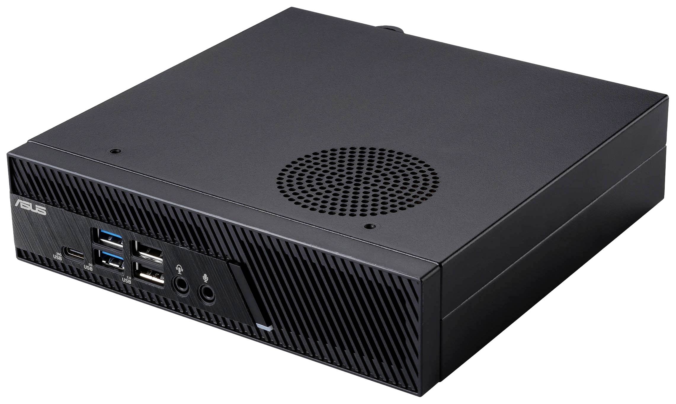Ein schwarzer Mini-Computer mit mehreren USB-Anschlüssen und Lüftungsschlitzen, auf einem Tisch stehend.