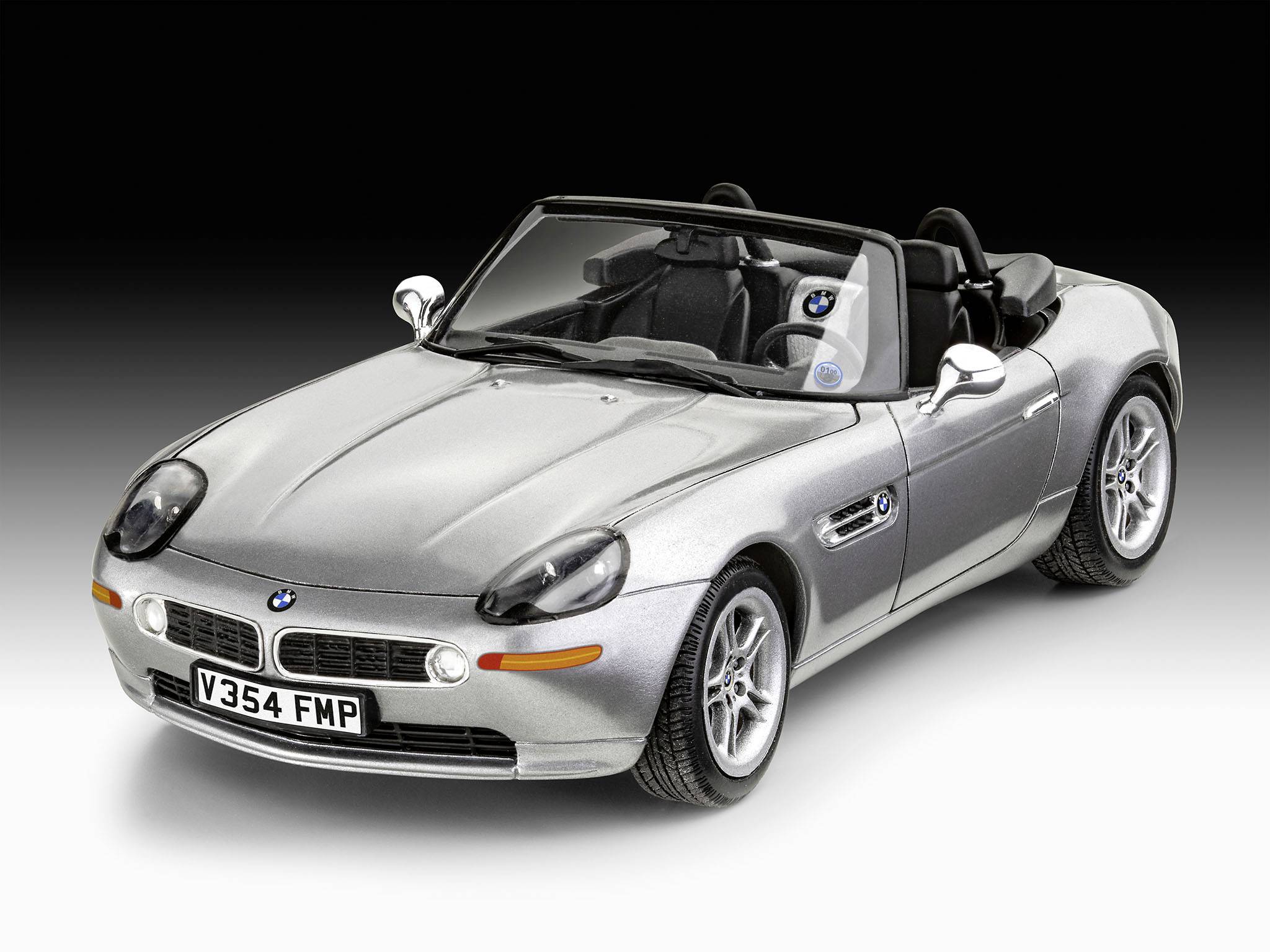 Silberner Cabrio-Sportwagen mit geöffnetem Dach, Vorderansicht. Automodell mit charakteristischen seitlichen Lufteinlässen.