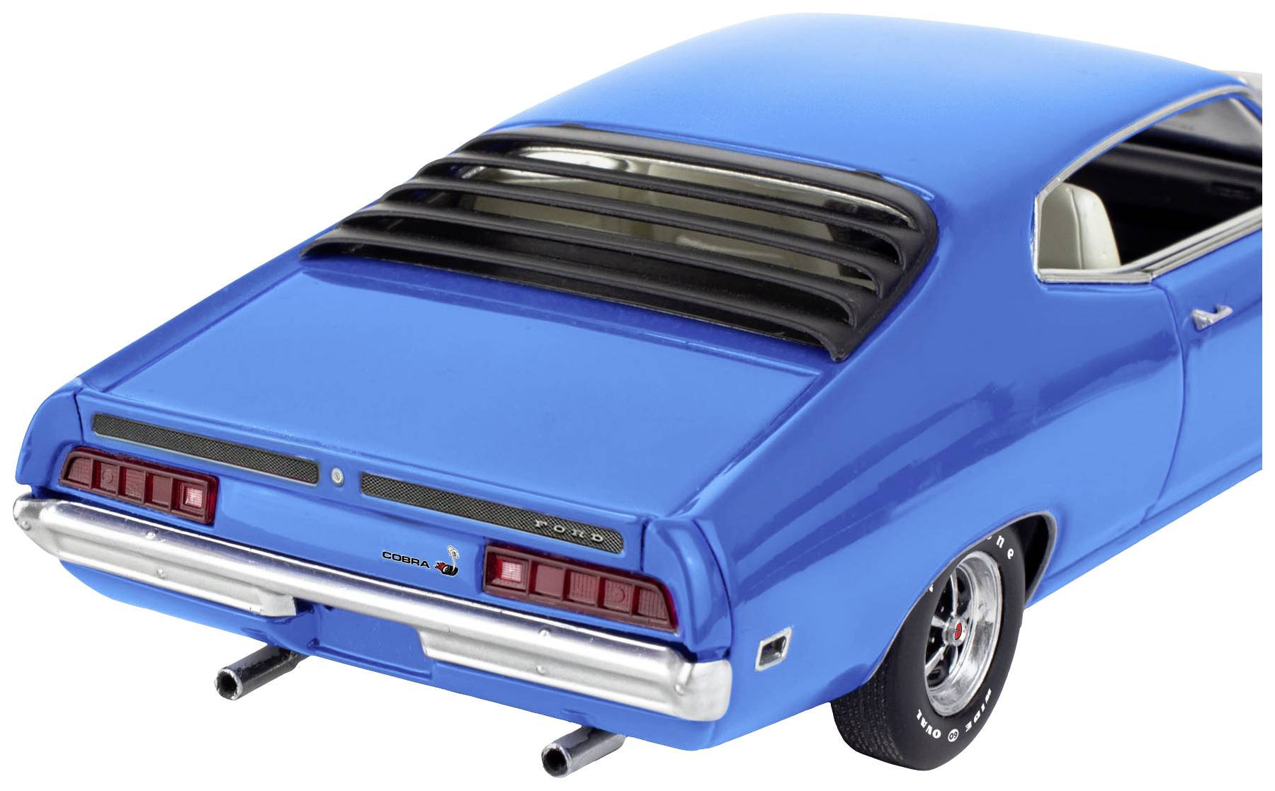 Ein blauer Oldtimer mit getönten Rückscheiben und auffälligen Rückleuchten. Das Auto hat klassische Formen und Chromdetails.