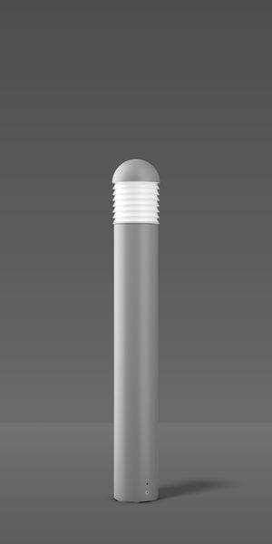 Graue zylindrische Außenleuchte mit geriffeltem Leuchtkopf, stehend auf grauem Boden vor grauem Hintergrund.