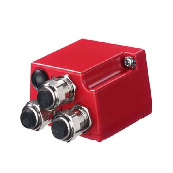 Rotes Gerät mit drei metallischen Anschlüssen.