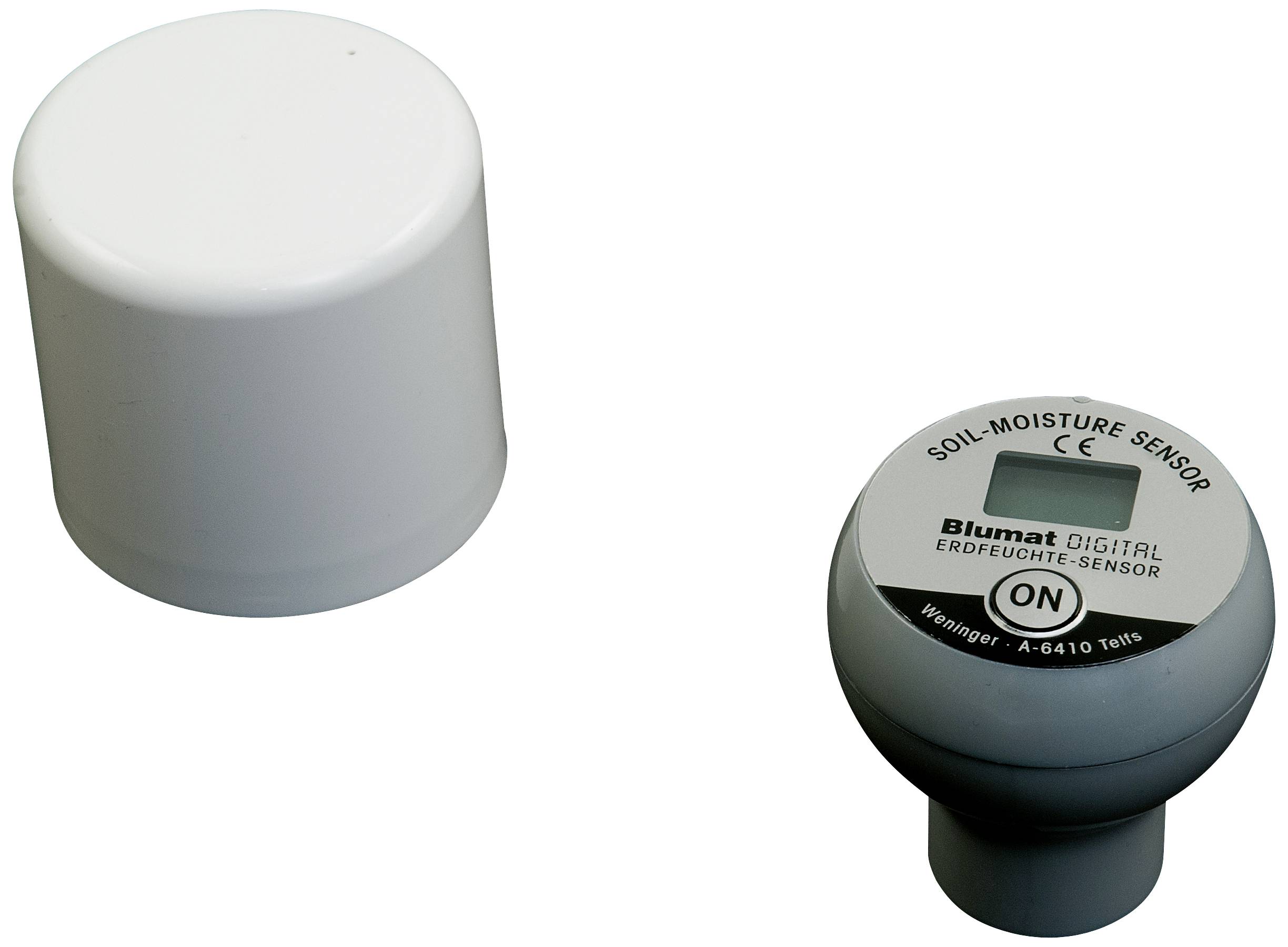Ein digitaler Bodenfeuchtesensor mit Schalter und weißer Abdeckung, zur Überwachung der Erdfeuchtigkeit in Pflanzenanwendungen.