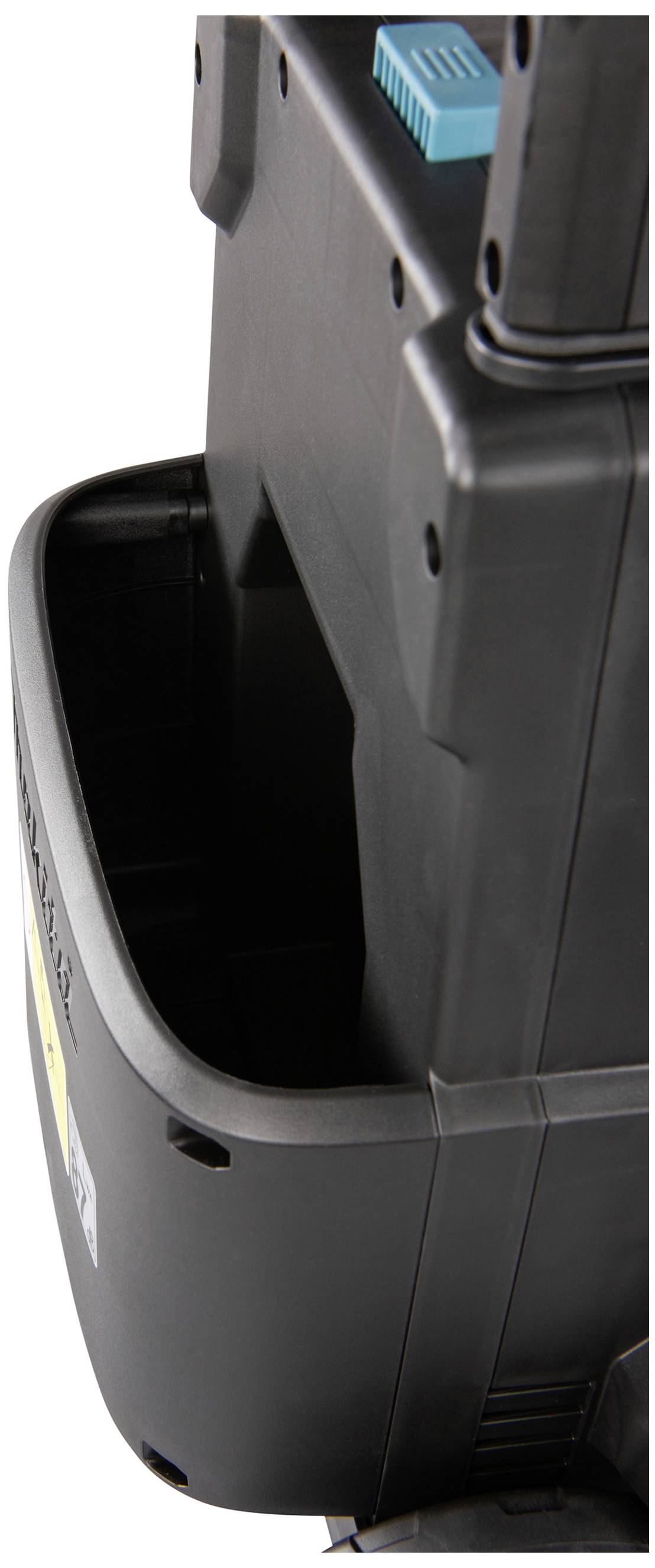 Ein schwarzes Kunststoffgerät mit einem rechteckigen Fach an der Seite. Ein blaues Element sitzt oben auf dem Gerät.