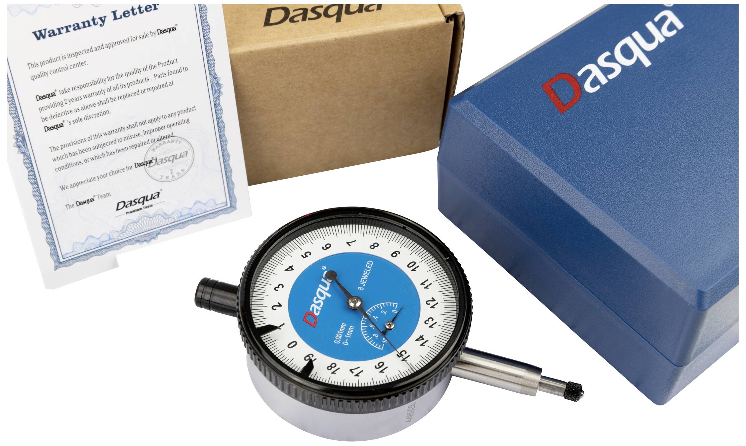 Analoges Messinstrument mit blauem Zifferblatt, beigefügt in einer Kartonverpackung, daneben eine Garantiebescheinigung.