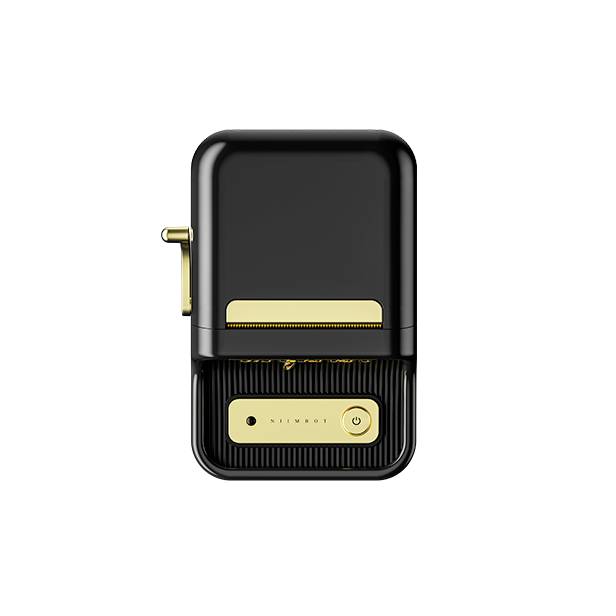 Schwarzer Miniatur-Kühlschrank mit goldenen Akzenten, Schalter unten auf der Tür, Retro-Design.