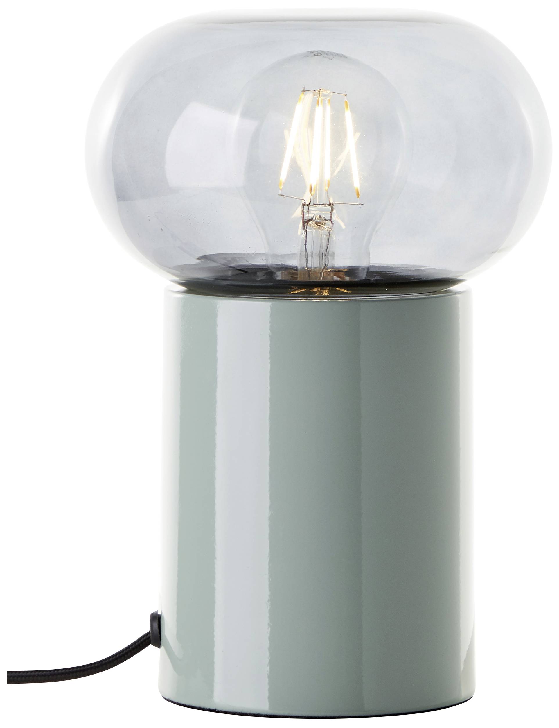 Eine Tischlampe mit klarem Glas und sichtbarer Glühbirne, auf einem metallischen Sockel. Ideal für modernes Innendesign.