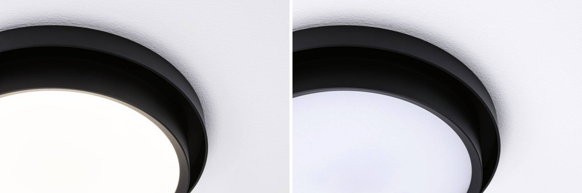 Eine Deckenleuchte mit zwei Lichtfarben: links warmweißes Licht, rechts kaltweißes Licht. Beide Leuchten sind in runden, schwarzen Fassungen.