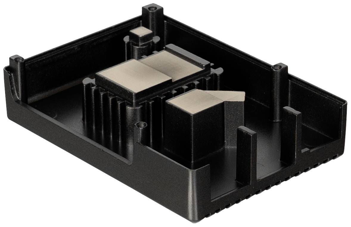 Ein schwarzes, rechteckiges Kunststoffgehäuse mit erhöhten, rechteckigen Metallkomponenten im Inneren, möglicherweise für elektronische Bauteile.