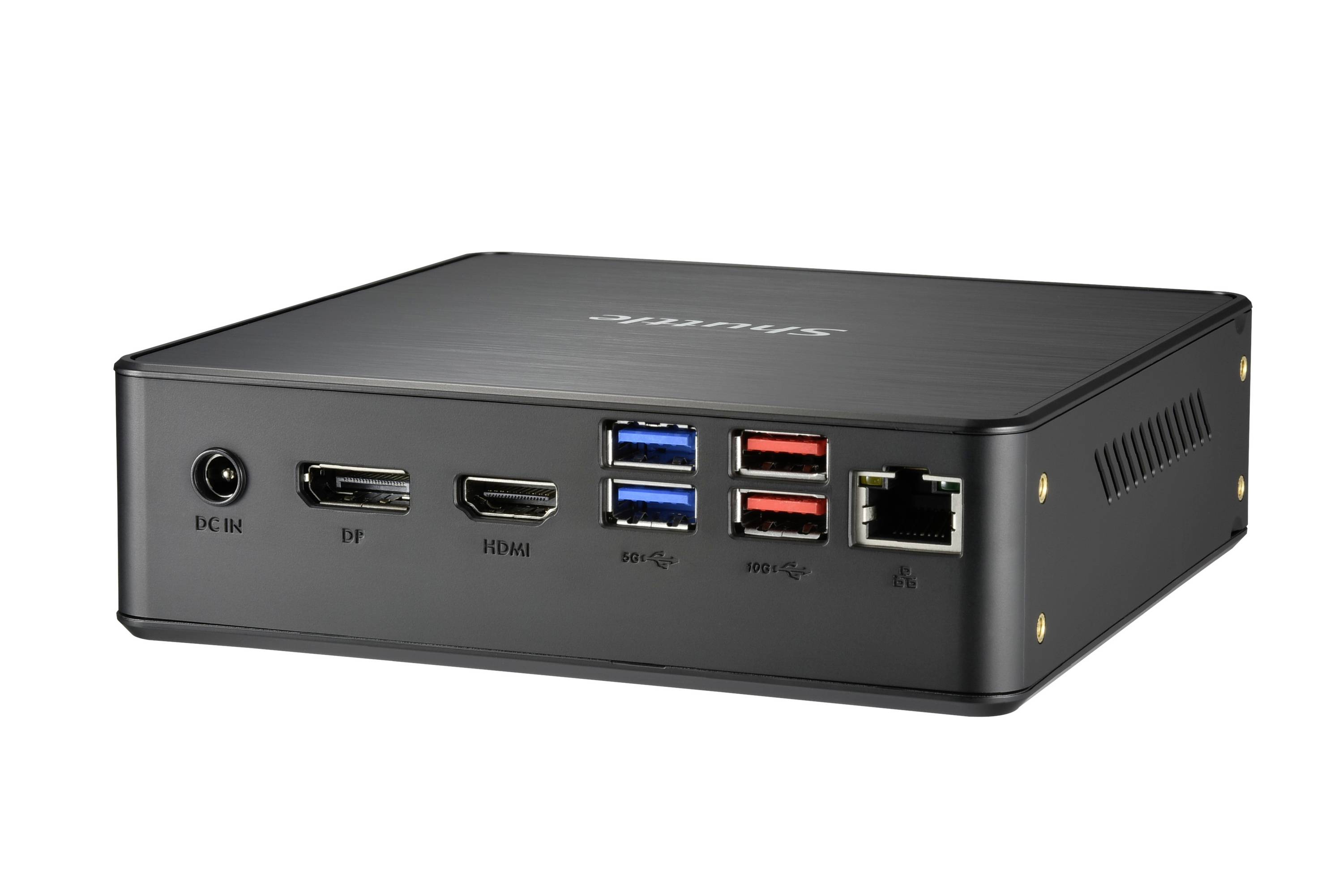 Ein schwarzer Mini-PC mit mehreren Anschlüssen, darunter USB, HDMI, Ethernet und Netzteilanschluss, geeignet für kompakte Arbeitsplätze.
