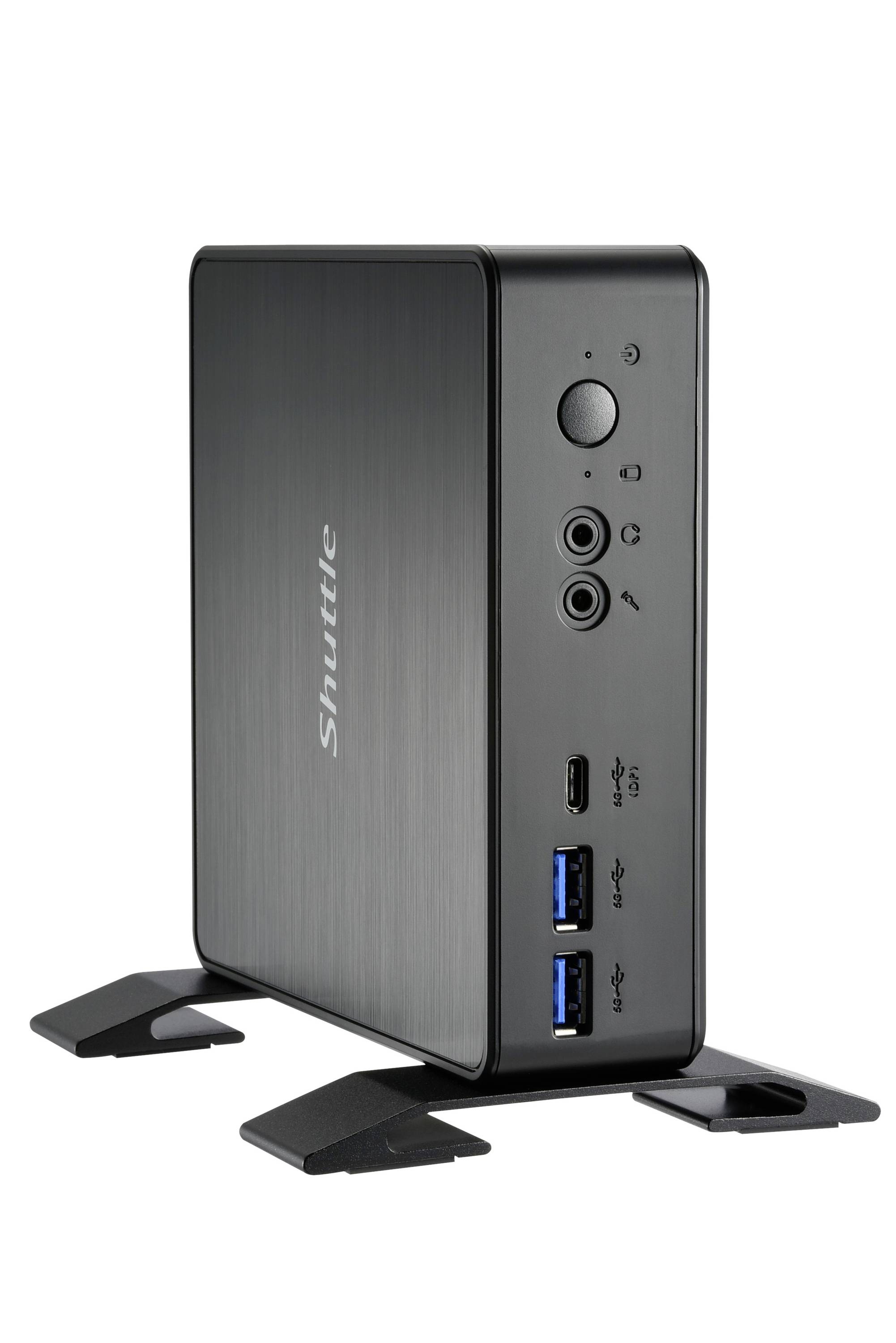 Kompakter schwarzer Mini-PC mit mehreren Anschlüssen, darunter USB, Audio und Strom. Steht vertikal auf zwei Standfüßen.