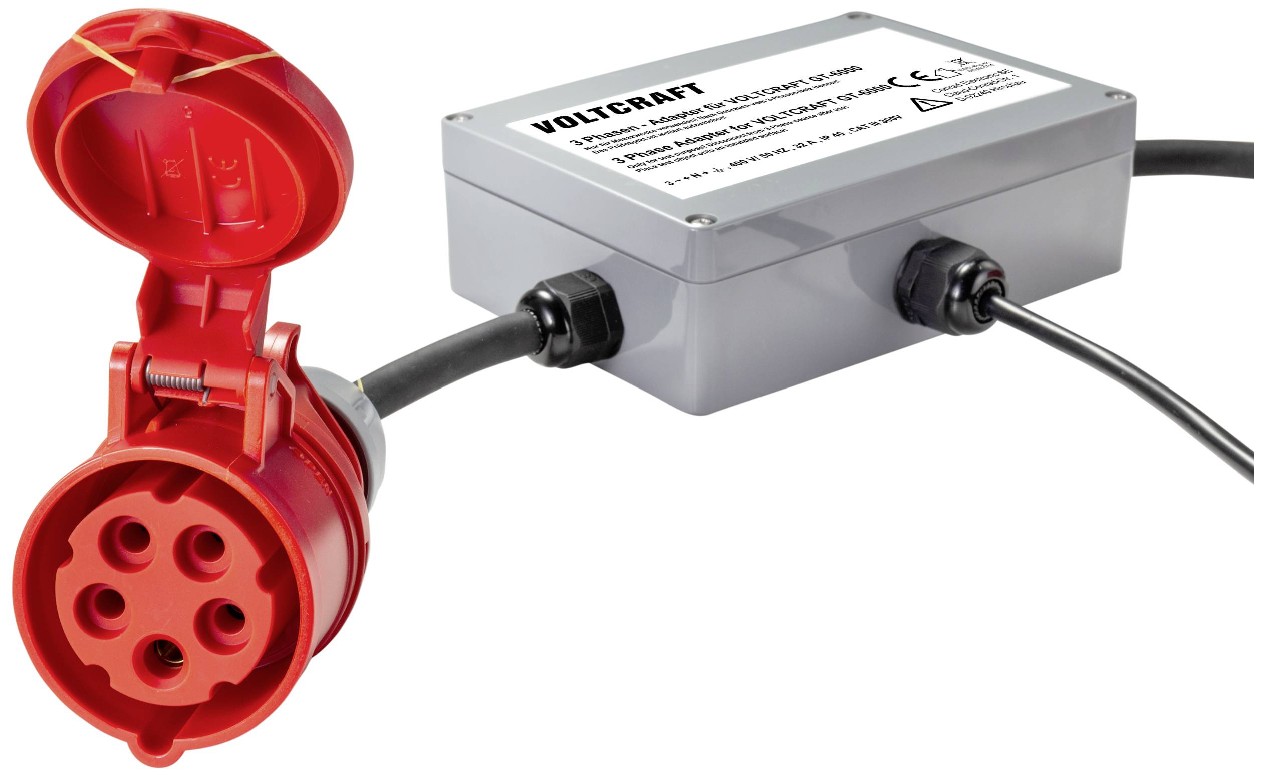 Roter elektrischer Adapter mit grauem Gehäuse und schwarzem Kabel. Gehäuse zeigt 'VOLTCARAT' und technische Spezifikationen.