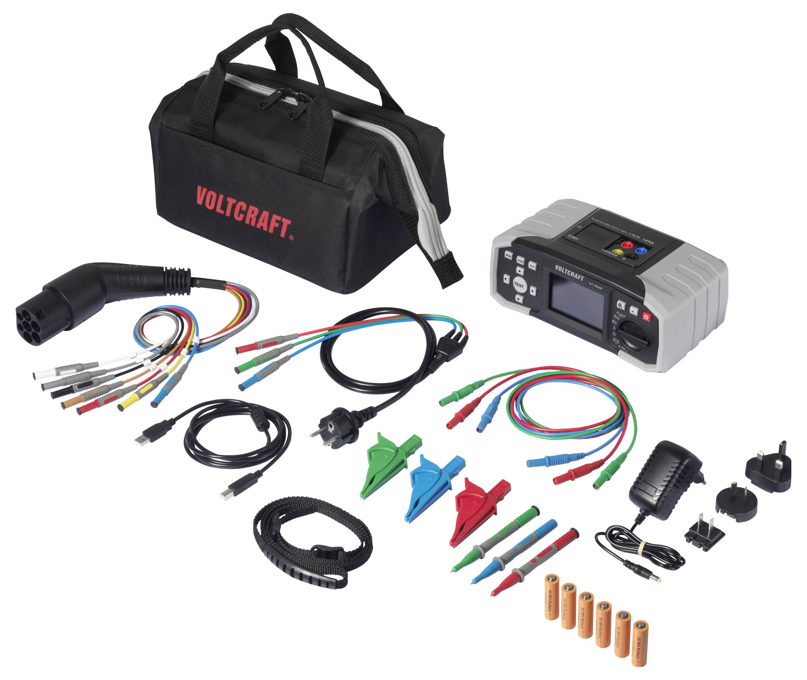 Ein 'VOLTCRAFT' Teseter-Set inklusive Hauptgerät, Kabeln, Klemmen, Netzadaptern und Tragetasche. Geeignet für elektrische Prüfaufgaben.