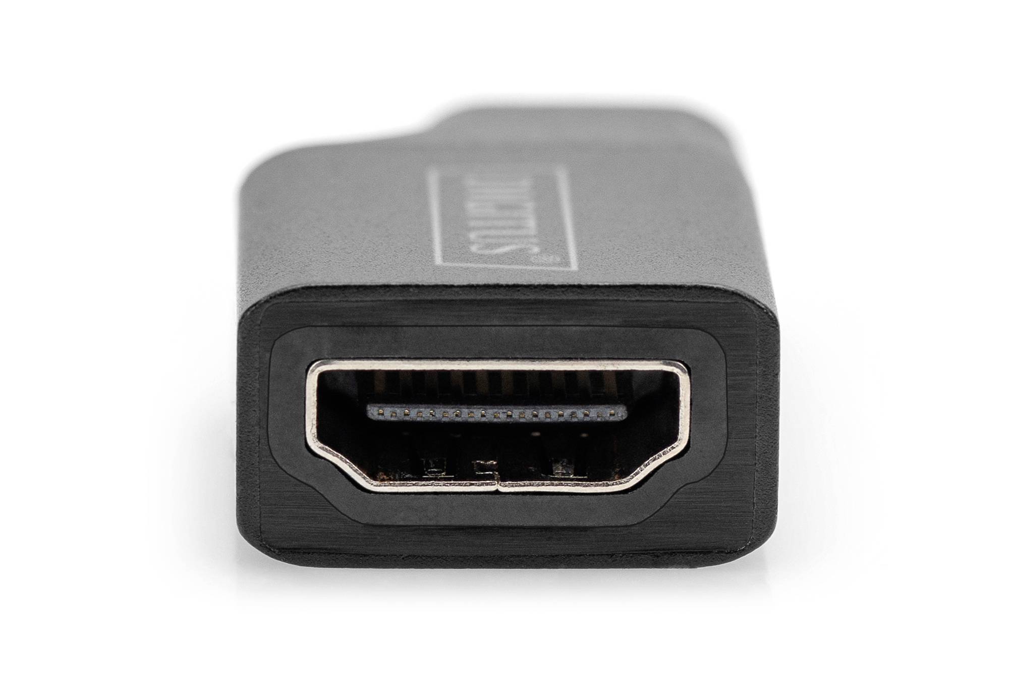 Ein schwarzer HDMI-Adapter mit sichtbarer Anschlussöffnung, die für die Verbindung von HDMI-Kabeln genutzt wird.