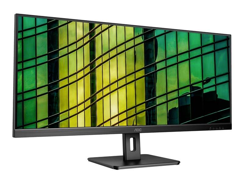 Ein Computermonitor mit einem abstrakten, farbenfrohen Hintergrund, bestehend aus grünen und gelben Glasfenstern und geschwungenen Linien.