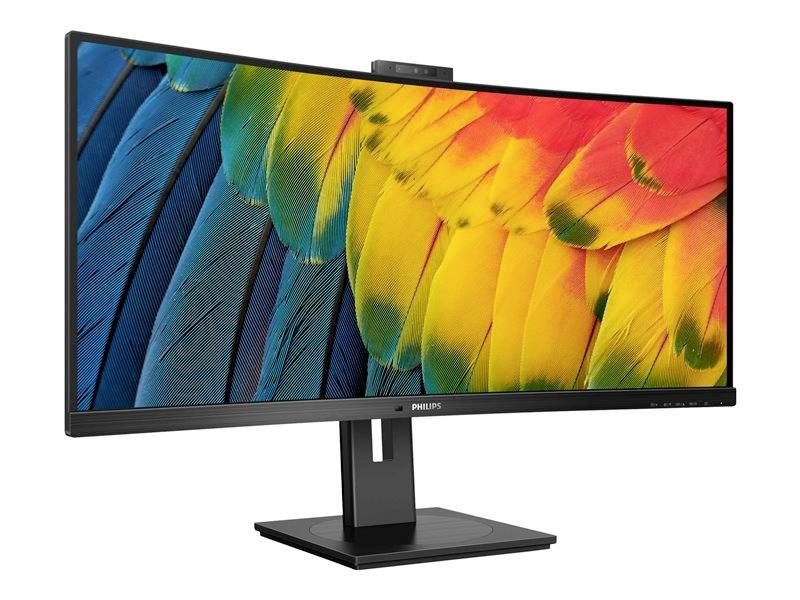 Ein Breitbildmonitor mit lebendigem Papageienfedern-Hintergrund. Der Monitor hat einen schmalen Rahmen und eine eingebaute Webcam.