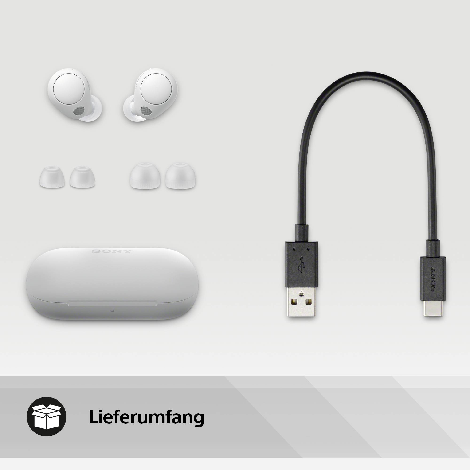 Sony-Ohrhörer-Set: kabellose In-Ear-Kopfhörer, Ladecase, austauschbare Ohrstöpsel und USB-C-Ladekabel, abgebildet in Weiß.