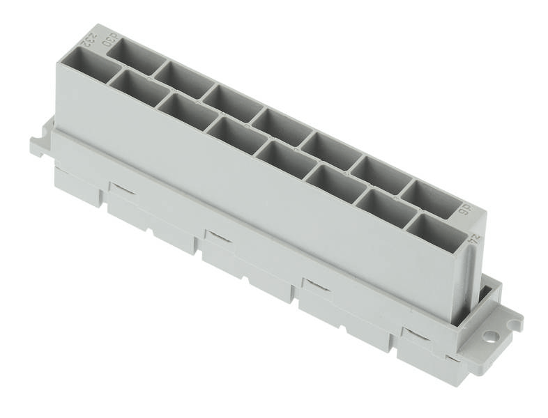 Ein grauer rechteckiger Steckverbinder mit mehreren Öffnungen zur Aufnahme von Stiften, zur elektrischen oder mechanischen Verbindung.
