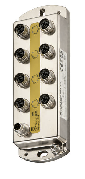Ein Industrie-Switch mit acht Anschlüssen auf einer gelben Leiste. Die Anschlüsse sind rund und gleichmäßig verteilt.