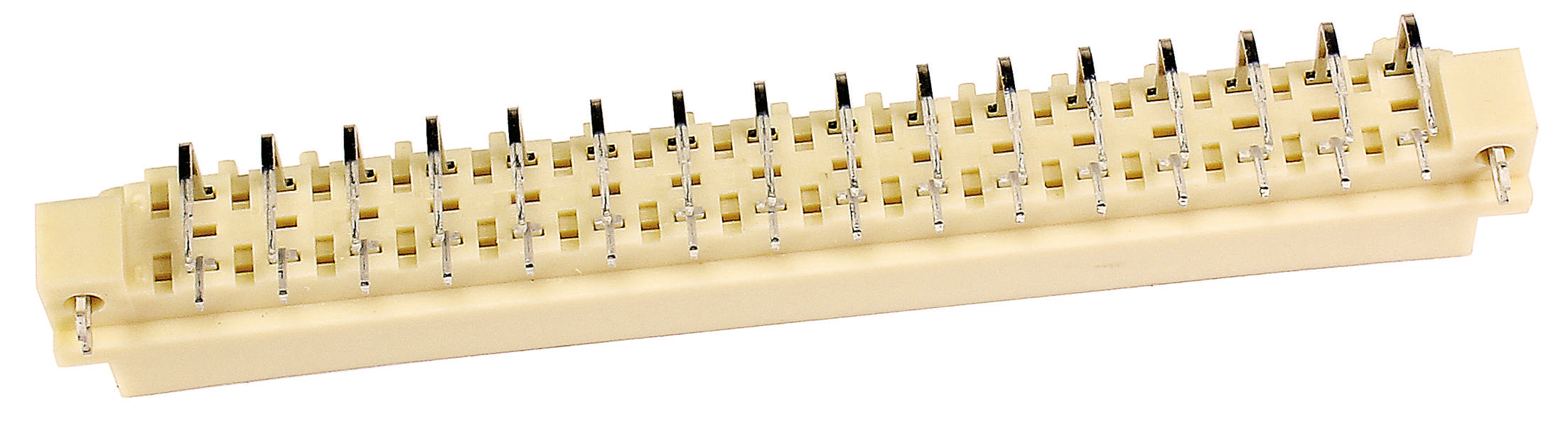 Ein rechteckiger, beige Steckverbinder mit mehreren Metallstiften sichtbar auf der Oberseite.