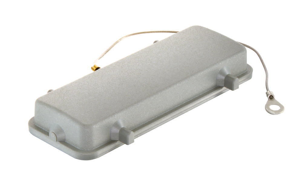 Ein graues elektronisches Gerät mit Drahtanschlüssen, möglicherweise eine Art von Sensor oder Antenne.
