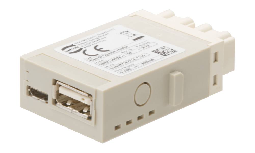 Ein rechteckiges elektrisches Gerät mit USB-Anschluss und mehreren Etiketten. Hauptsächlich beige, hat es Anschlussmöglichkeiten.