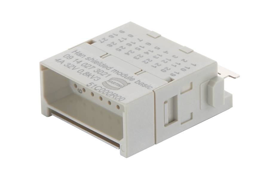 Ein graues elektrisches Steckermodul mit der Aufschrift 'Han shielded module basic' und technischen Spezifikationen.