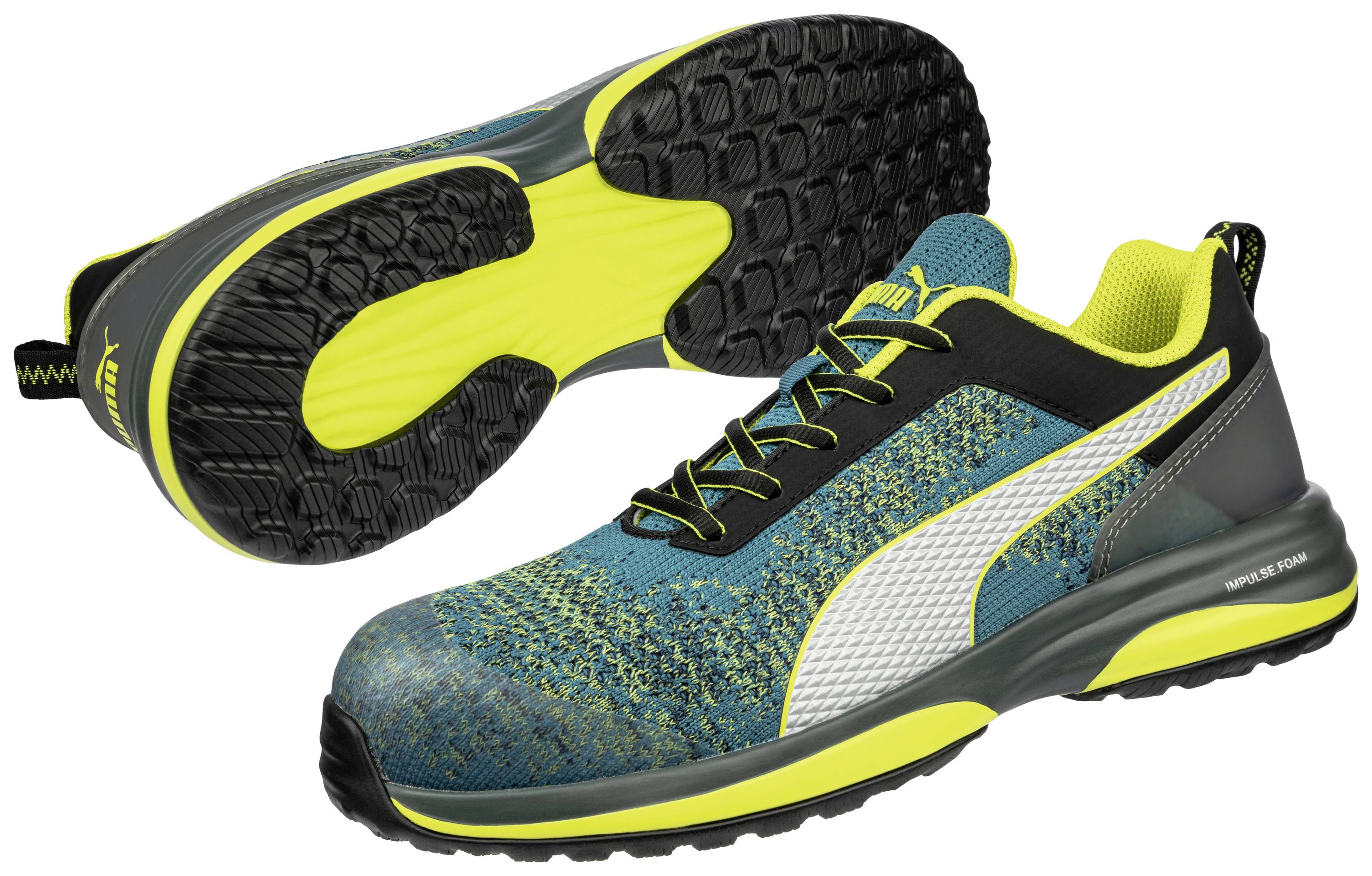 Grüner Sportschuh mit schwarzer Sohle, gelben Akzenten und weißem Streifen auf der Seite. Zeigt Sohle und Obermaterial.