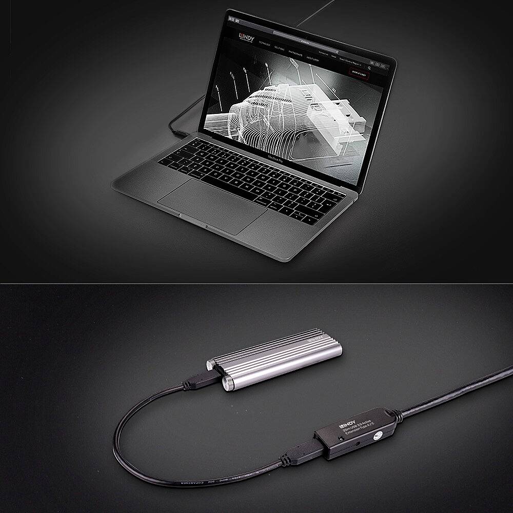 Ein geöffneter Laptop zeigt ein CAD-Modell auf dem Bildschirm. Davor liegt ein USB-C-Hub, verbunden mit dem Laptop.