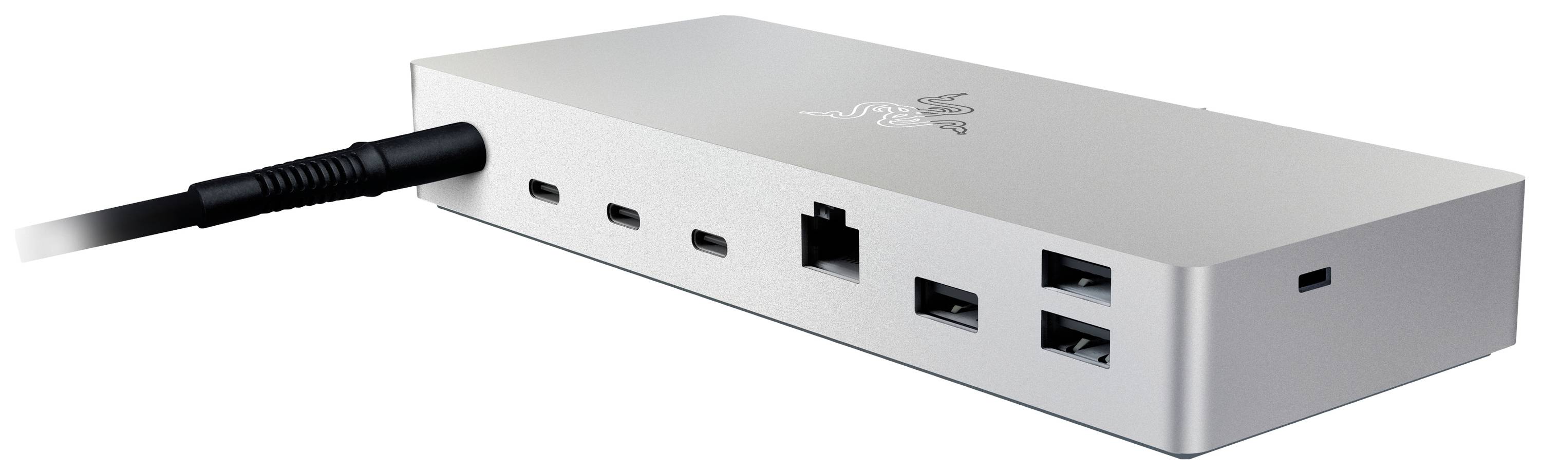 Ein silbernes Dockingstation-Gerät mit mehreren Anschlussmöglichkeiten: USB-C, Ethernet, und USB-A-Ports.