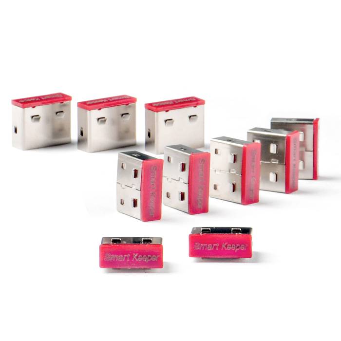 Mehrere rote und silberne USB-Anschlusssperren auf weißem Hintergrund. Sie sollen unbefugte Zugriffe auf USB-Ports verhindern.