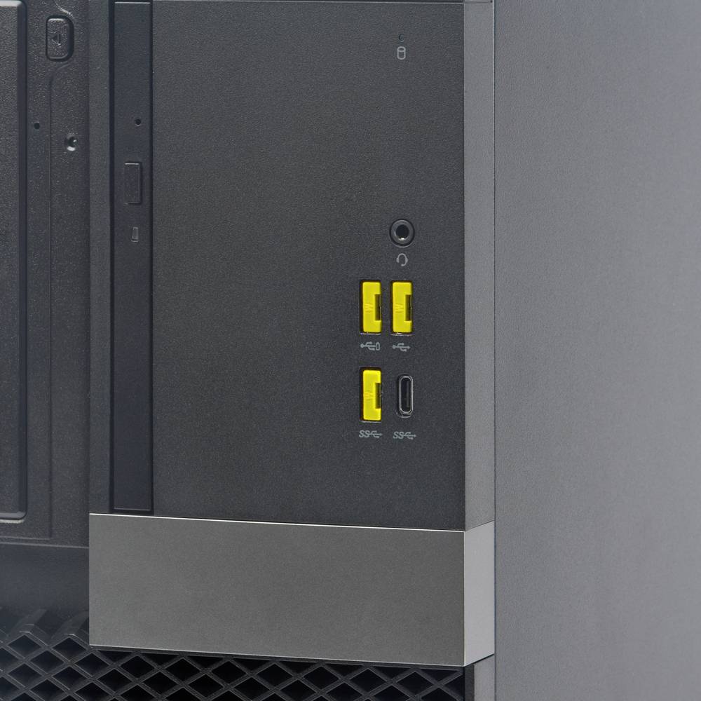 Ein Computergehäuse mit mehreren Anschlüssen, darunter USB- und Audioanschlüsse mit gelben Markierungen, an der rechten Vorderseite.