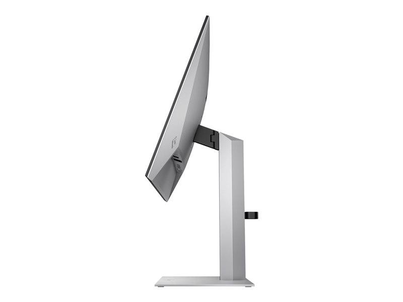 Ein seitlich fotografierter Computermonitor mit schlankem Design und silbernem Standfuß.